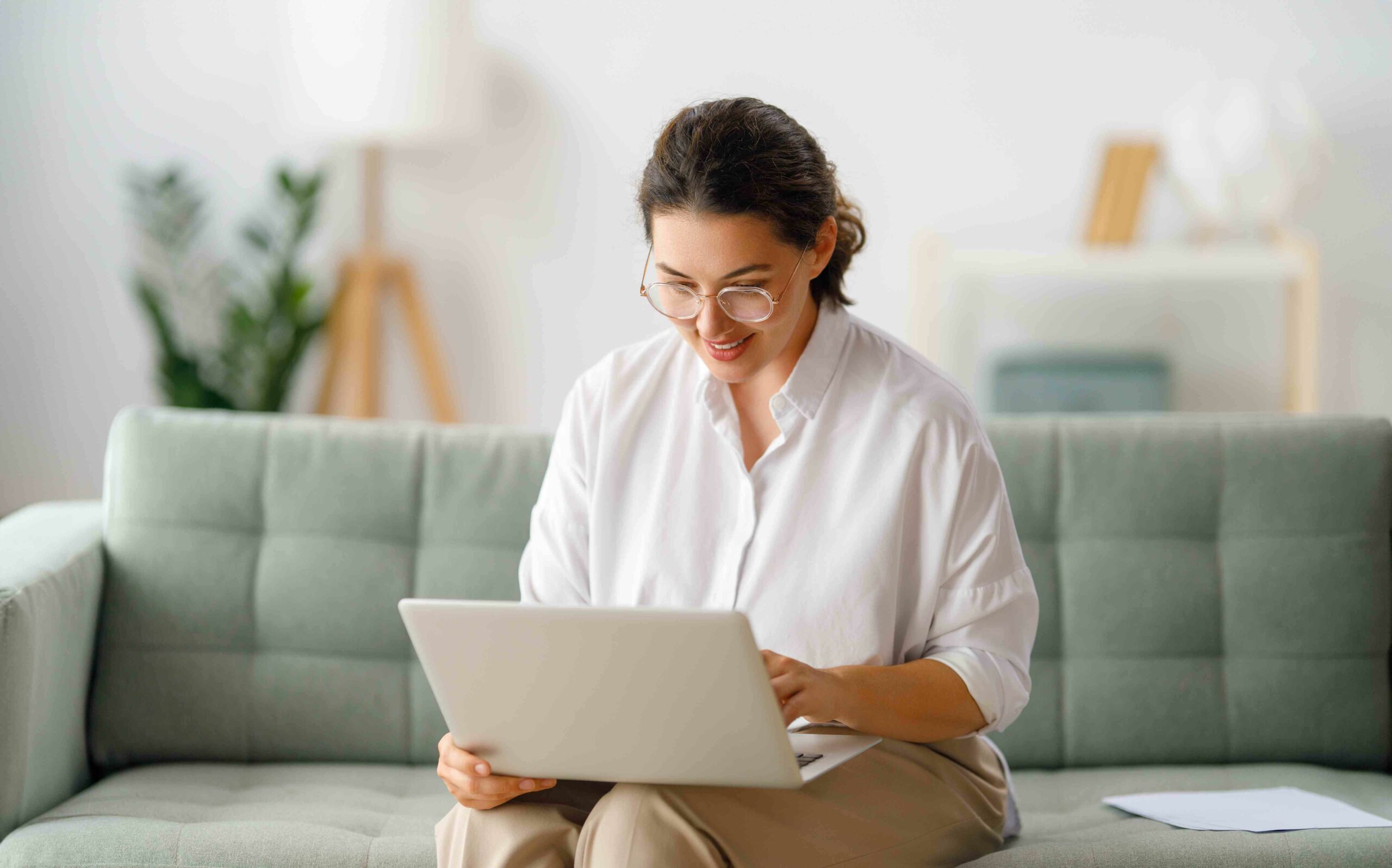 woman working on laptop at home 2023 11 27 05 15 46 utc compressed scaled